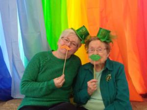 Orchard View's St.Patty's Day 2017- Mom & Daughter blowing kisses under the rainbow
